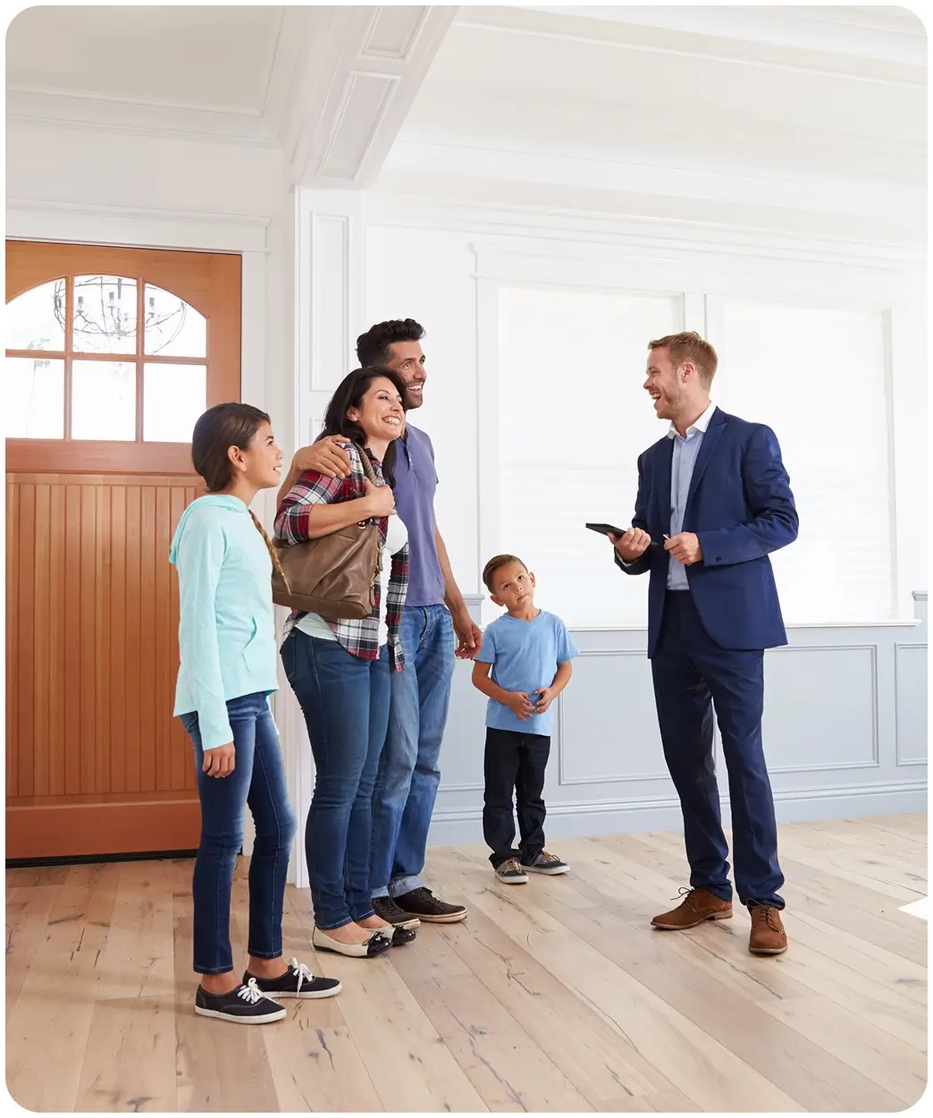 Family meeting with real estate agent indoors.